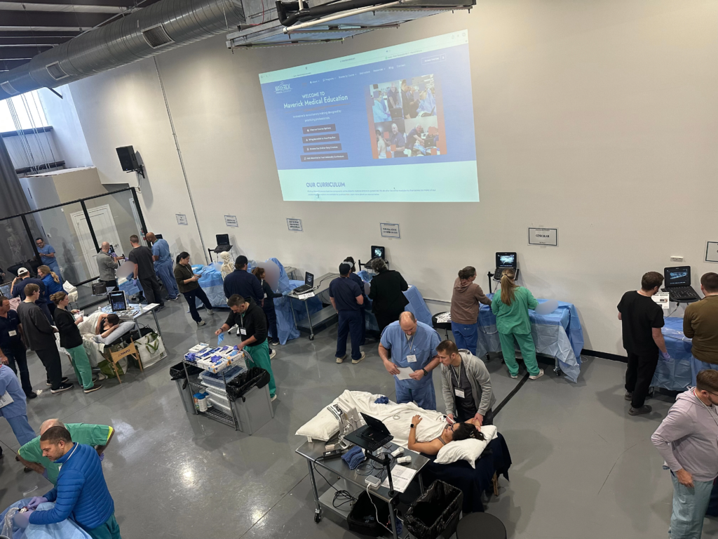 Aerial view of new facility where students are training at various stations.