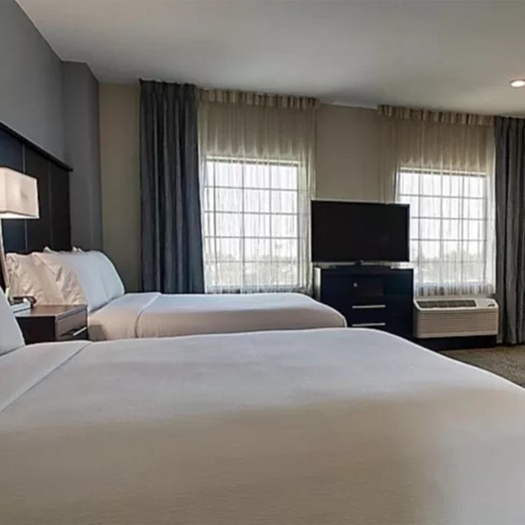 Hotel room with two beds.