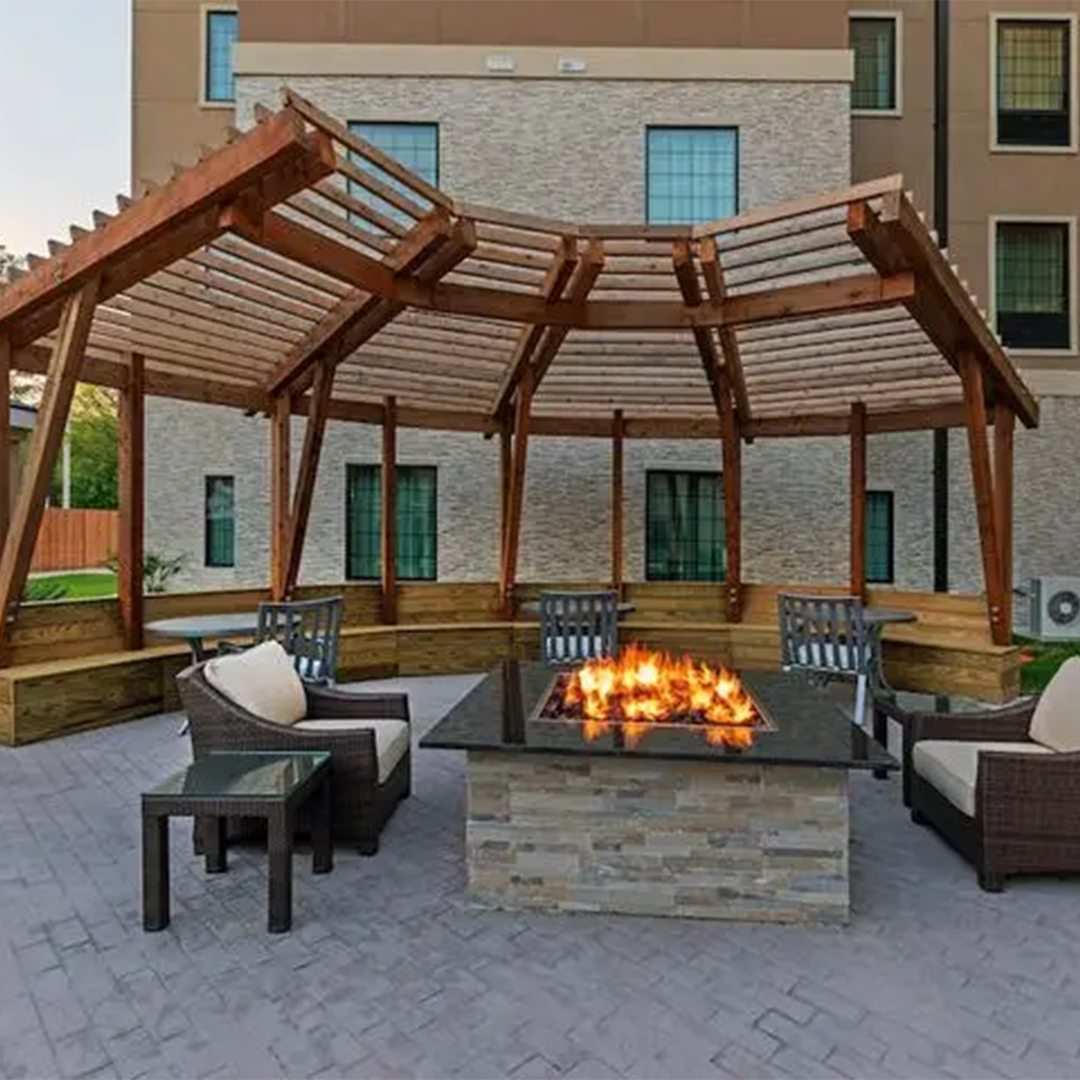 Fire pit and outdoor seating at a hotel.